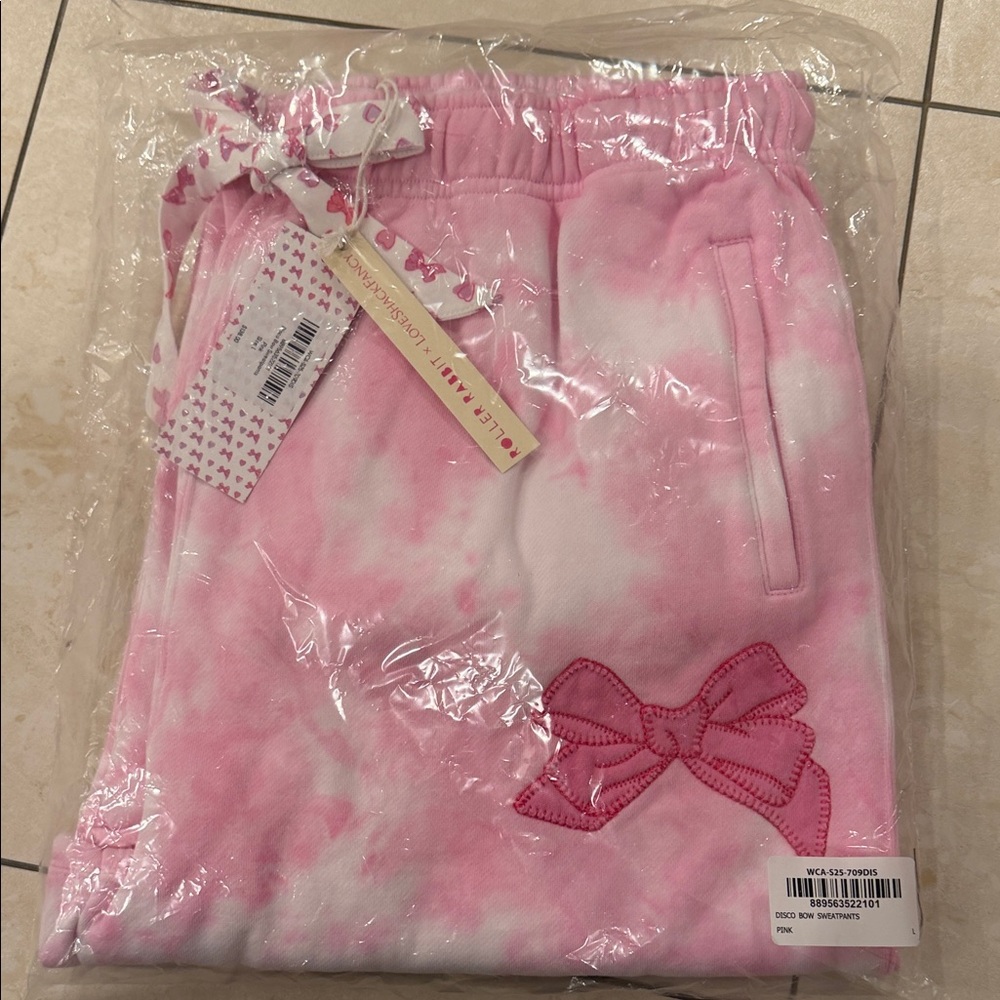 Loveshack fancy roller rabbit collaboration. Disco bow sweatpants size large.